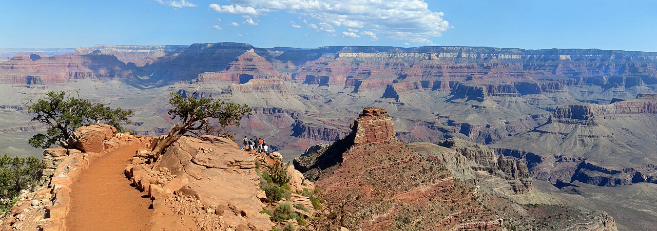 A guided group exploring a Grand Canyon trail